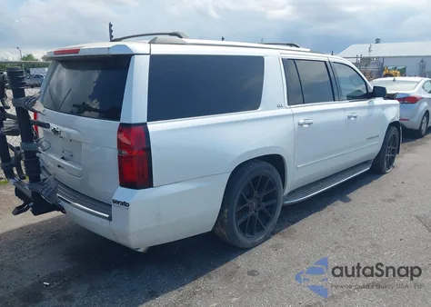 2016 Chevrolet Suburban Ltz z USA, uszkodzony, nr VIN 1GNSCJKC7GR258686
